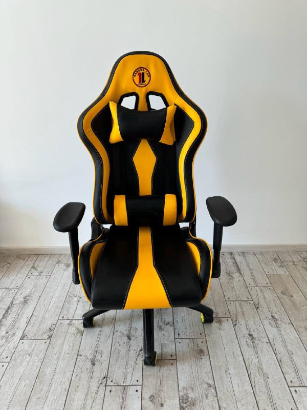 Yellow computer chair with neck and lumbar pillows 2
