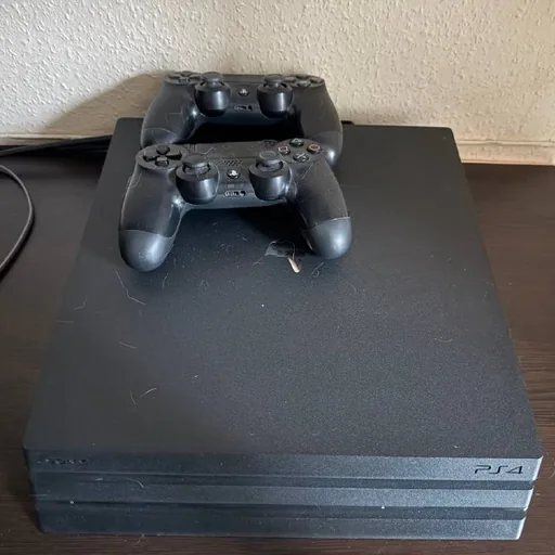 PS4 Pro 1 ТБ, 2 джойстики, диски ігор