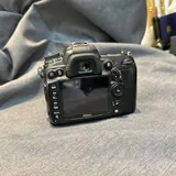 Фотоаппарат Nikon D7000 с объективом и зарядным устройством 2