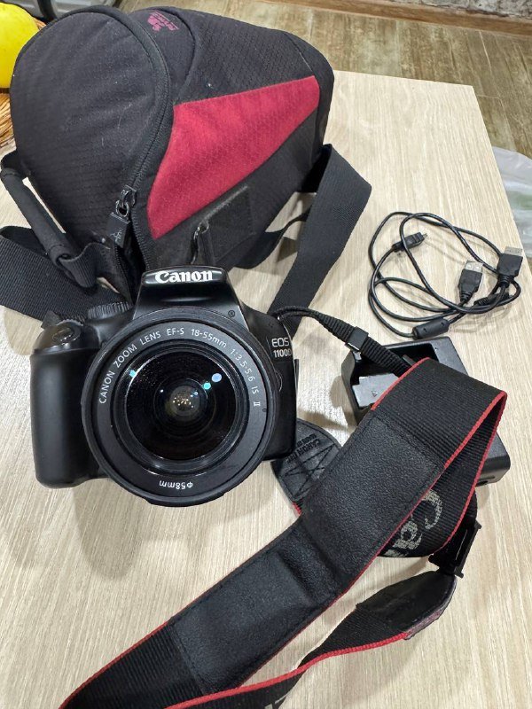 Фотоаппарат Canon 1100D, зарядное устройство, чехол 4