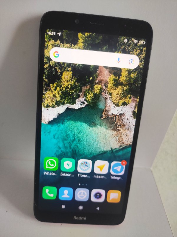 Redmi 7A phone with case and charger