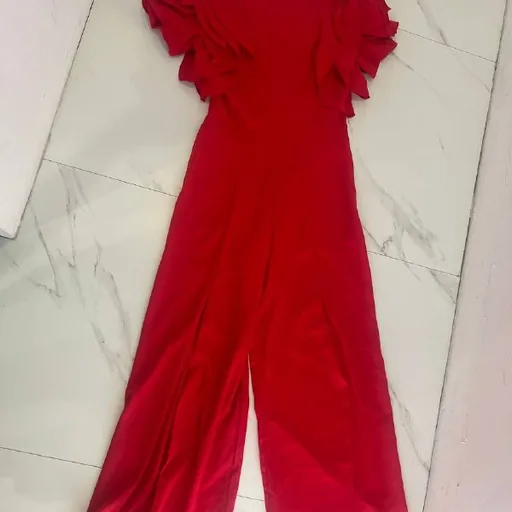 Red jumpsuit, white dress