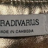 Золотые брюки Stradivarius 5