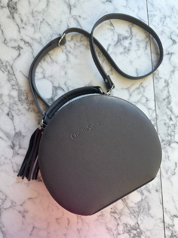 Сумка круглой формы российского бренда