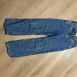 Джинсы и черные штаны XS 5