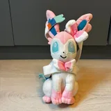 Мягкие игрушки: крокодил, Стич, кролик, панда, покемон, хомяк, тигрёнок, Пикачу, ленивец, осьминог 5