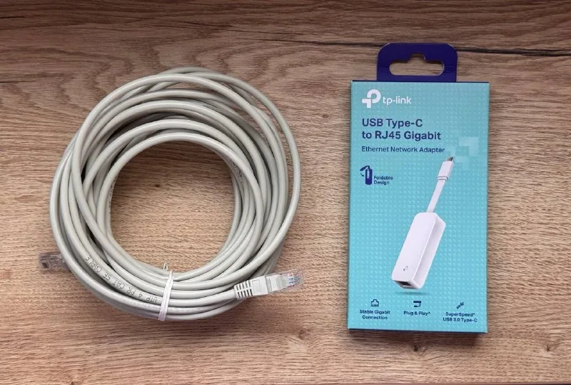 Сетевой адаптер TP-Link UE300C и Ethernet-кабель 1