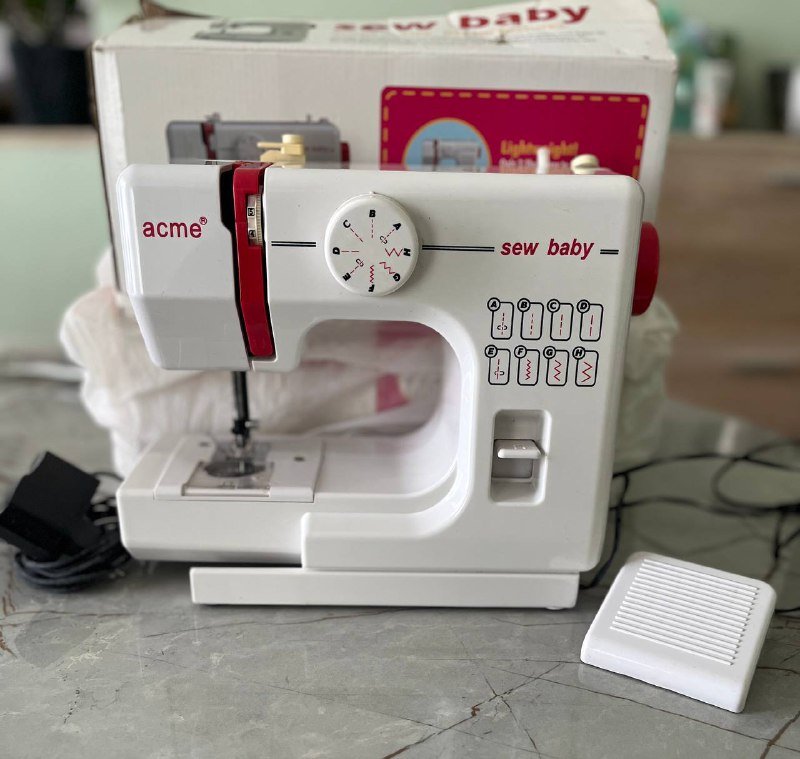 Маленькая швейная машина