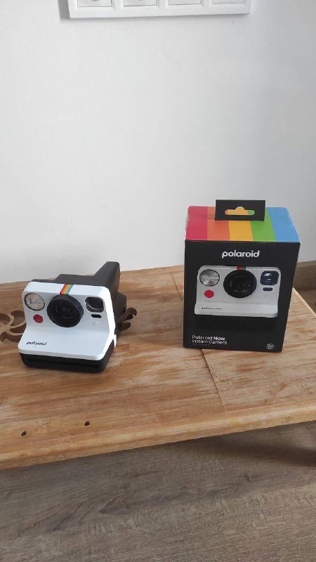 Фотоаппарат Polaroid с кадрами