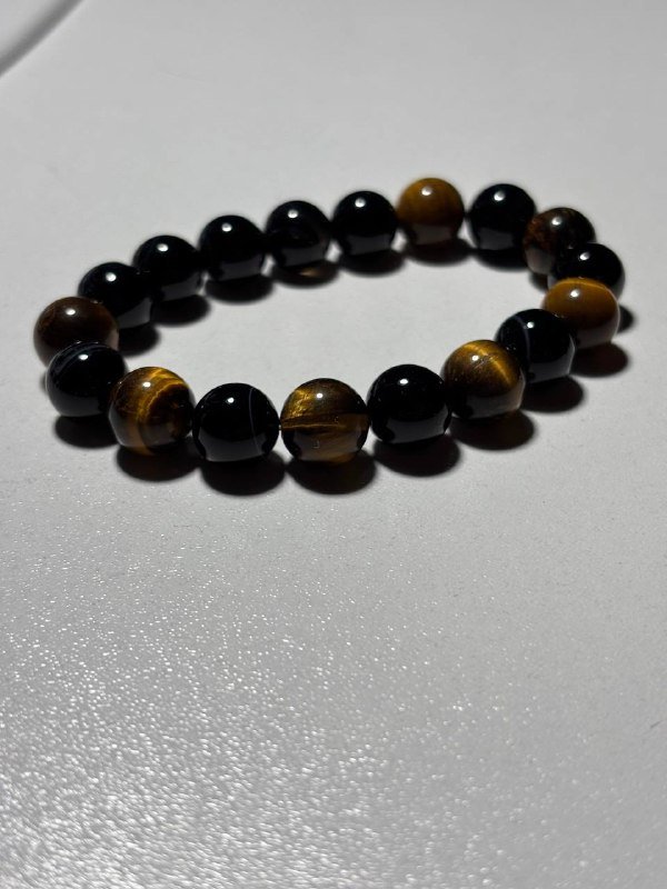 браслеты унакит и кошачий глаз с мешочком 4