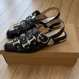 Балетки Steve Madden, черные и белые 4