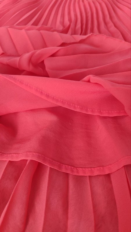 Оранжево-коралловая юбка гармошка на змейке сбоку