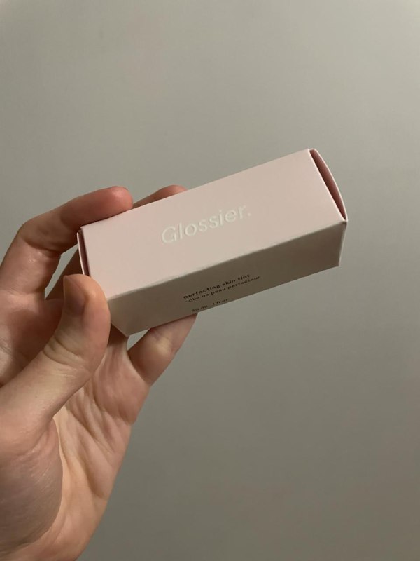 Glossier Perfecting Skin Tint, Body Shop lipstick, bronzer brush, La Roche-Posay balm, MAC pencils 2