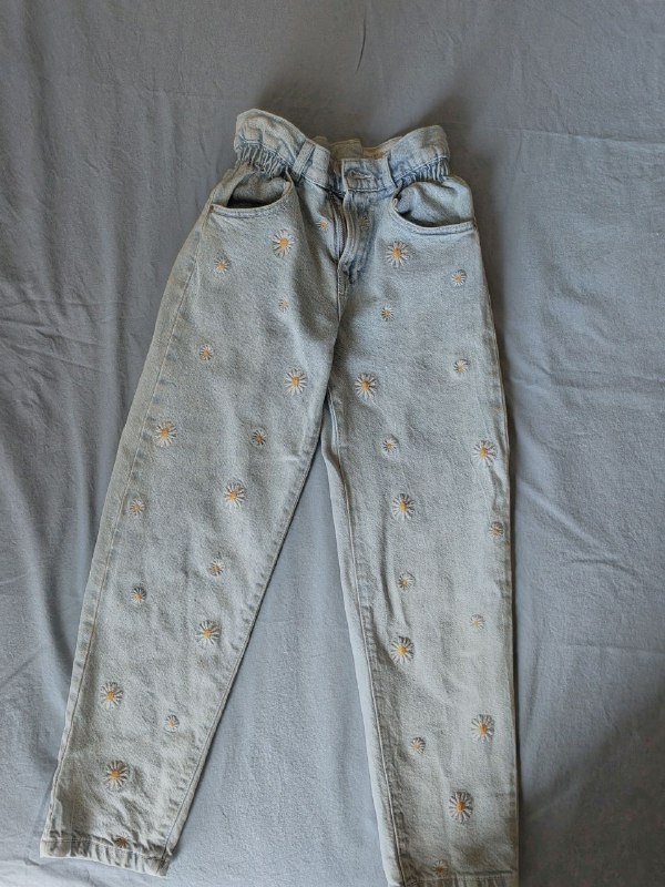 Джинсы на девочку 9-10 лет