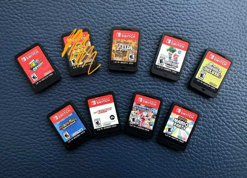 Картриджи Nintendo Switch, Super Mario Odyssey, Zelda Breath of the Wild, Super Mario Bros. Wonder, New Super Mario Bros. U Deluxe, Mario+Rabbids, Need for Speed, Mario Kart 8 Deluxe, Super Mario Party