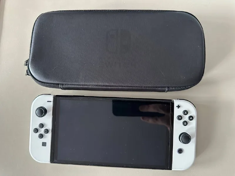 Nintendo Switch OLED, док-станция, Joy-Con, чехол, зарядное 1