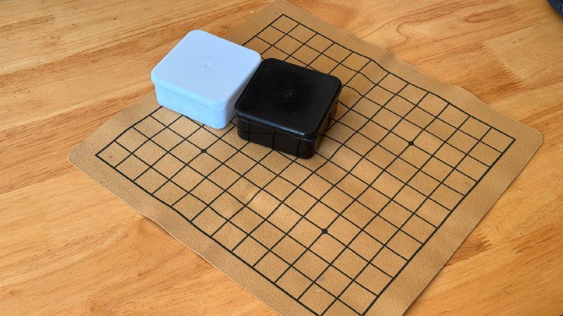 Набор для игры в Go с кожаной подложкой и каменными фишками 3