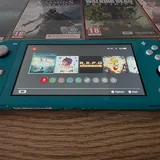 Nintendo Switch Lite, 10 games, MicroSD 128GB, case 3
