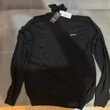 Водолазка Guess, лонгслив Guess, толстовка Guess, футболка Armani Exchange 1