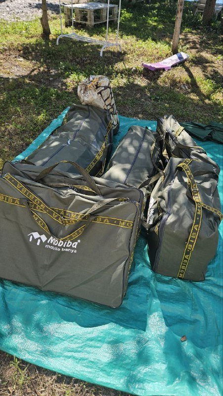 Мобильная баня Мобиба МБ-552, печь банная, бак, полки, матрасы, стол, стулья, зонт, гамаки, качель 3