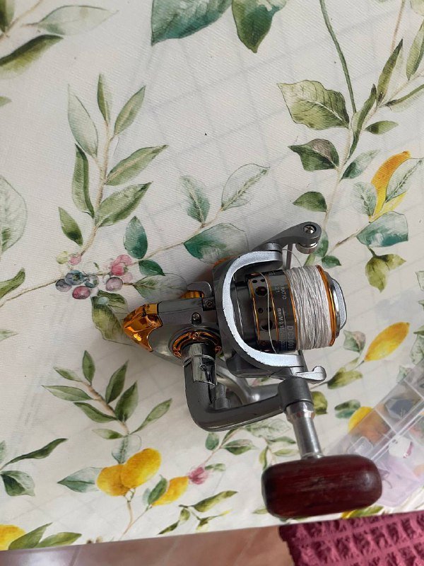 2 удочки и катушка с леской 4