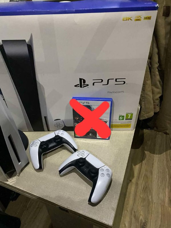PlayStation 5 console with controllers 2