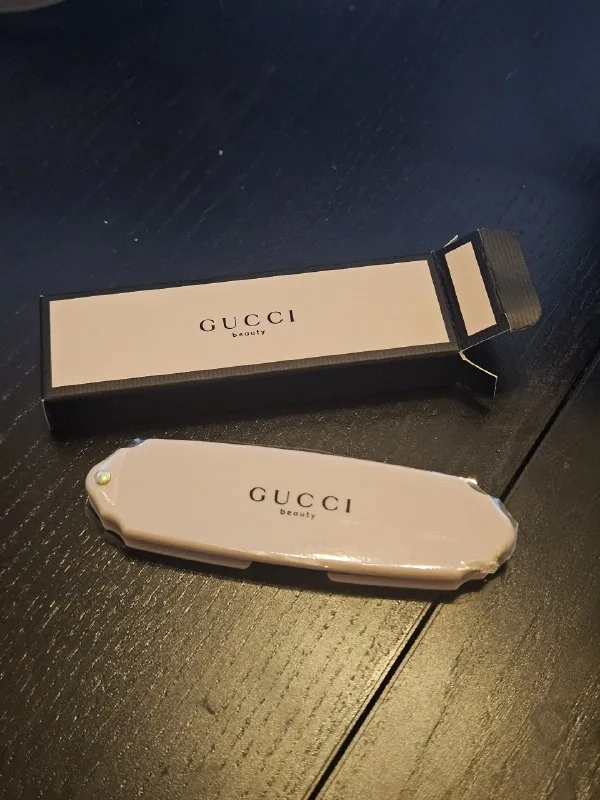 Складная расчёска Gucci 1
