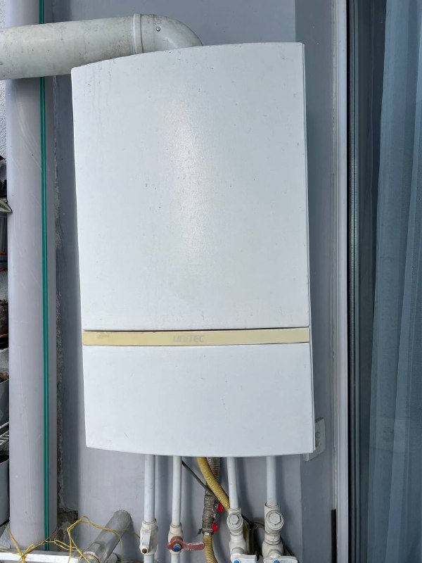 Котёл б/у с трубой