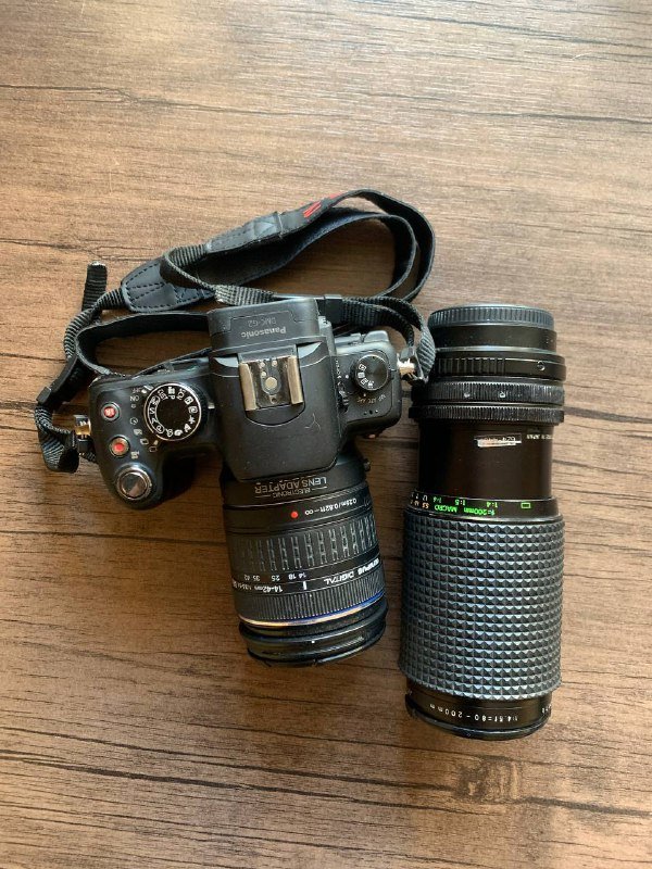 Пленочный фотоаппарат Minolta 7000AF с объективом и вспышкой, Цифровой фотоаппарат Panasonic LUMIX DMC-G2 с объективами и аксессуарами 7