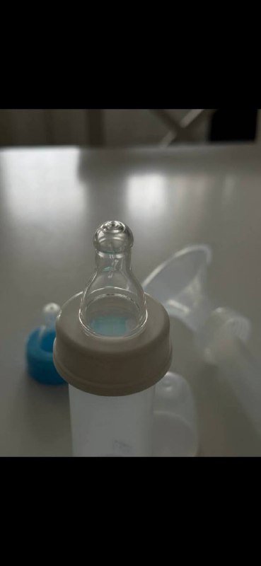 Молокоотсос механический с бутылочкой и соской 2