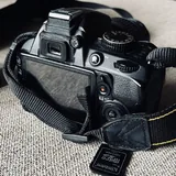 Nikon D3100 с объективом 18–55 мм VR 3