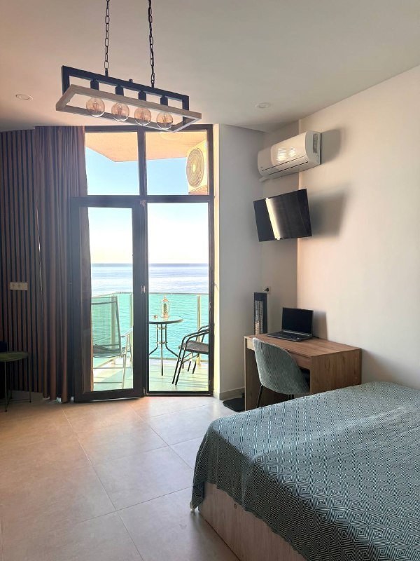 Уютная студия на первой линии с видом на море в Гонио 3