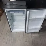 Холодильник, кресло, складная вешалка 1