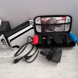 Nintendo Switch OLED, игры, док-станция, Joy-Con, чехол 2