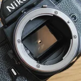 Плёночный фотоаппарат Nikon FM с объективом Nikkor 50mm 8