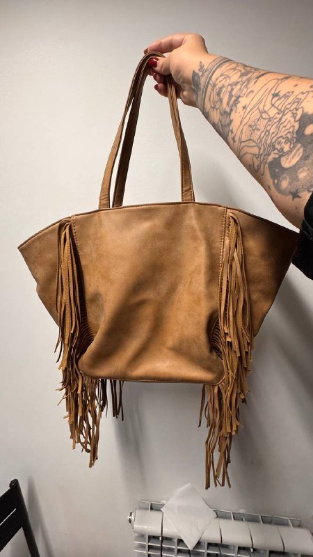 Кожаная сумка в стиле бохо