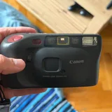 Беззеркальная камера Canon R, плёночная камера Nikon F4, плёночная мыльница Canon 7