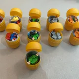 Игрушки из Киндера: динозаврики и супергерои DC 2