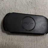 PSP с зарядкой, картой памяти и играми Sonic 3