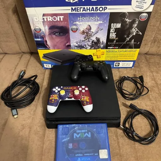 PlayStation 4 Slim 1TB with two controllers and a game