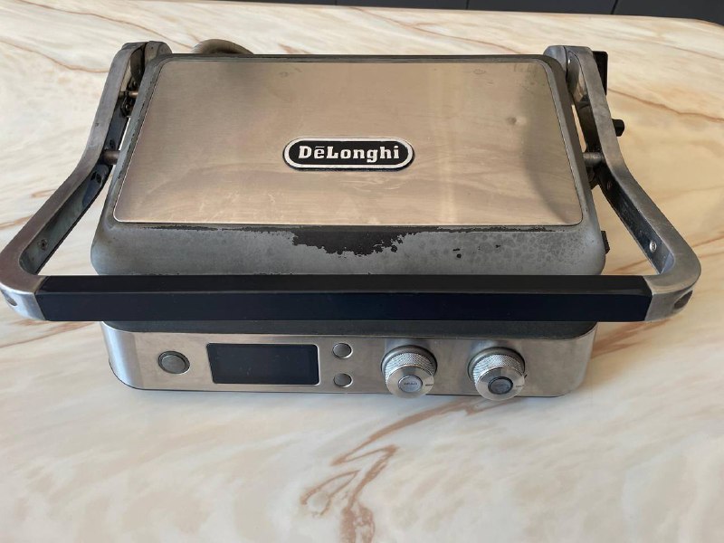 электрогриль DeLonghi с 6 съемными панелями