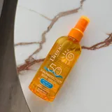 Сухое защитное масло для тела SPF 50 1