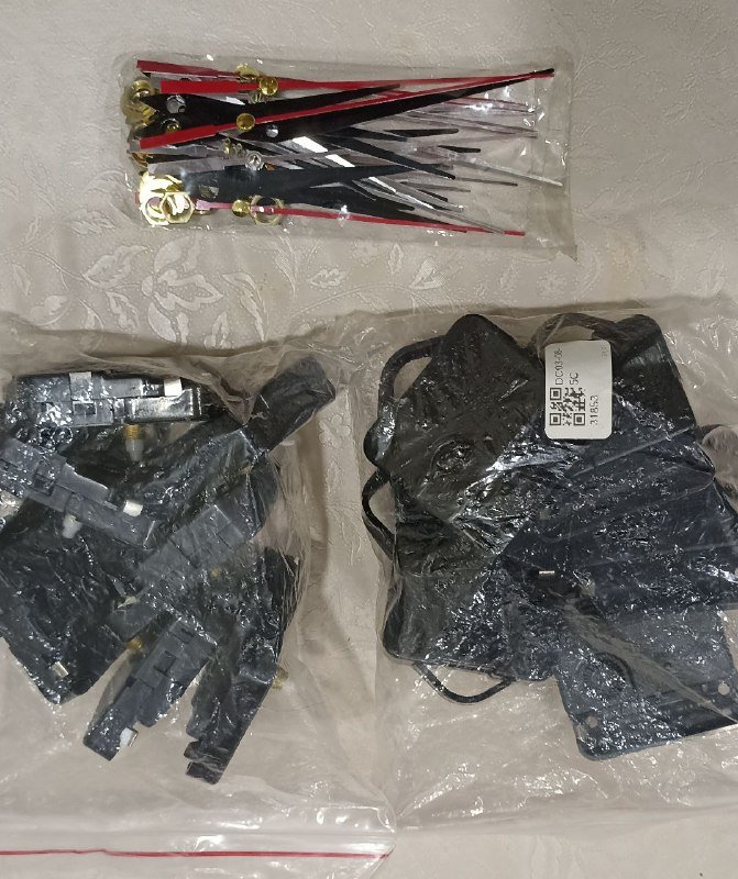 ботинки, жилет, плащ, пальто, шапка, механизмы для часов 7