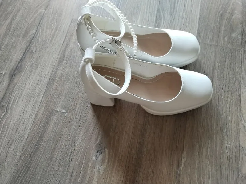 White dress, white shoes, black shoes 1
