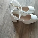 White dress, white shoes, black shoes 1