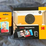 Фотоаппарат Kodak Printomatic, двусторонний пэд и барабанные палочки 1