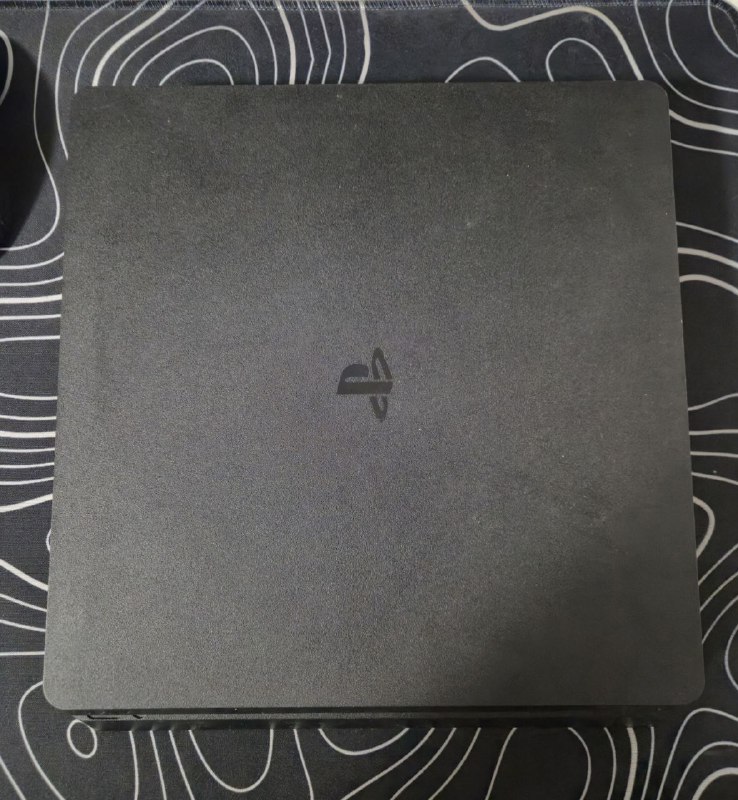 PlayStation 4 with FIFA 21 and Jurassic World Evolution 2 3
