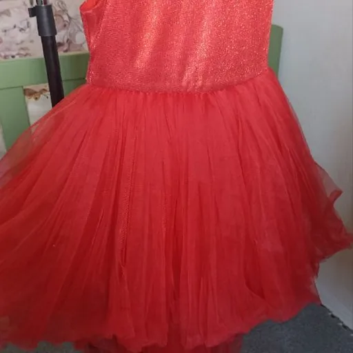 Fluffy children's dress with a train