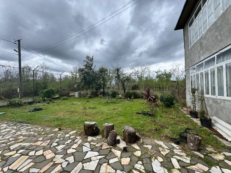 Дом с земельным участком