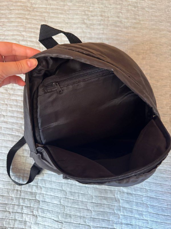 небольшой рюкзак из непромокаемой ткани с карманом на молнии 2